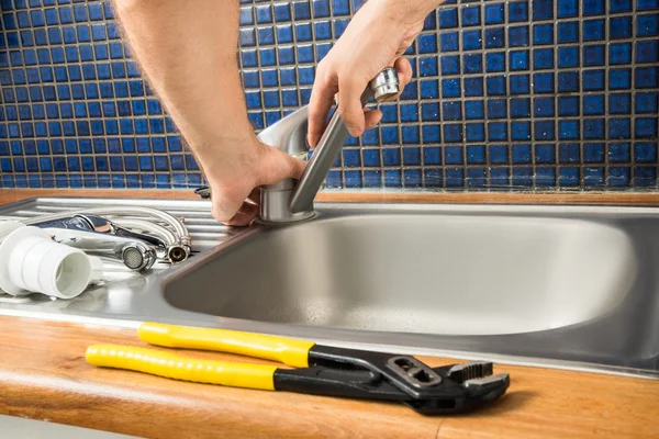 Hand Fixing Tap Of Sink — Stock Photo, Image