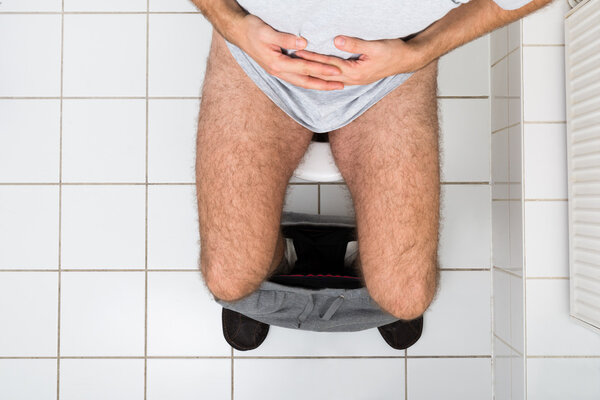 Man Suffering From Stomachache