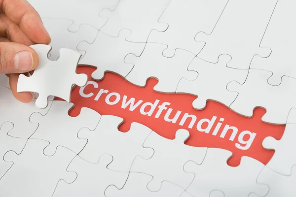 Crowdfunding Text Under Jig Saw Puzzle — Stock Photo, Image