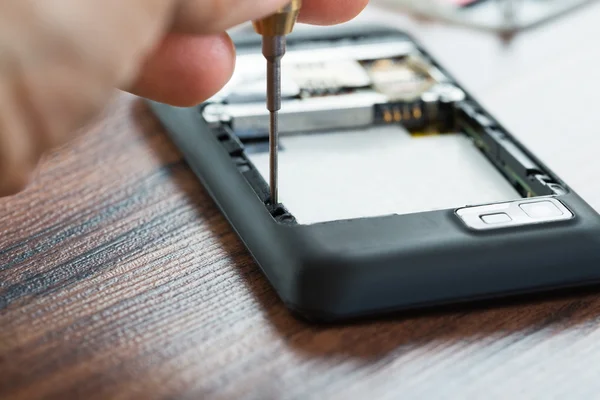 Technicus Hand vaststelling Cellphone — Stockfoto