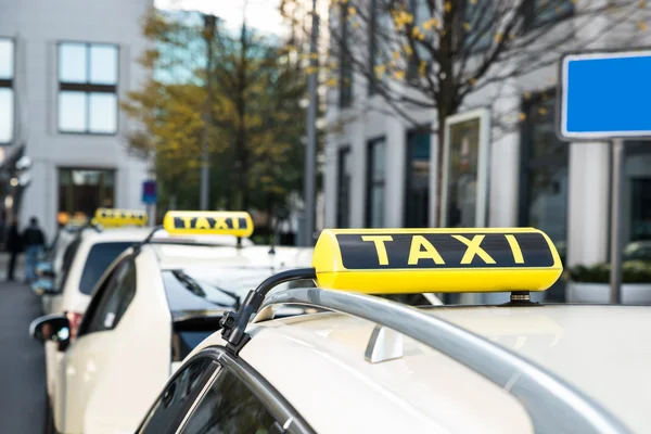 Array Of Taxi Taxs Parked — стоковое фото
