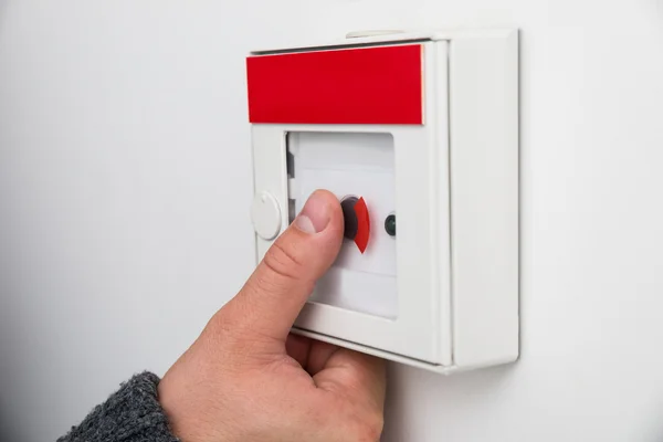 Man Pressing Emergency Button — Stock Photo, Image