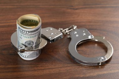Dollar Bills With Handcuffs clipart