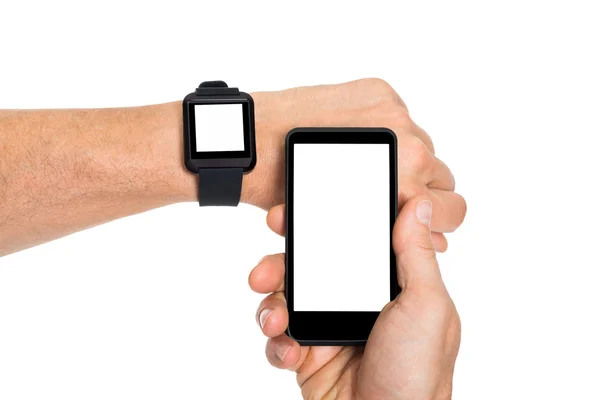 Hände mit Smartwatch und Handy — Stockfoto