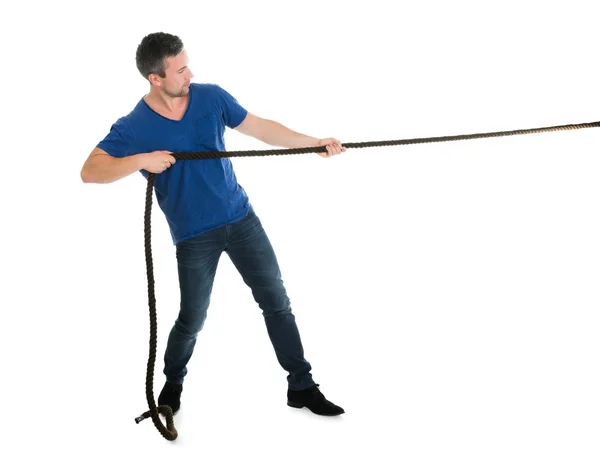 Man Pulling Rope — Stock Photo, Image