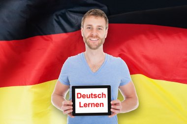 Dostum Holding Tablet ile öğrenin Almanca