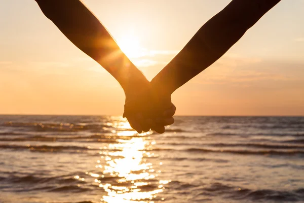 Couple holding hands — Stock Photo, Image