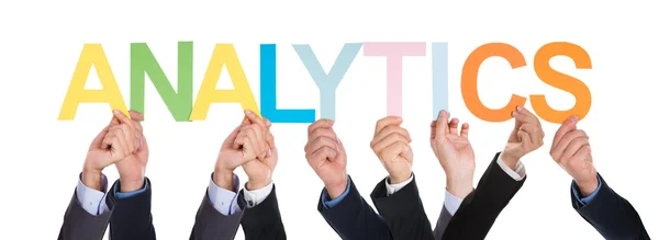 Händer med ordet Analytics — Stockfoto