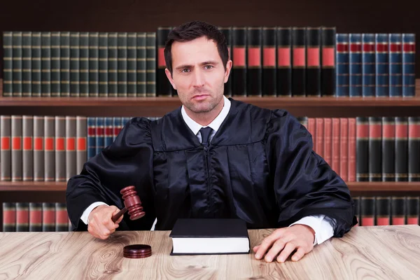 Judge Striking Gavel Royalty Free Stock Photos