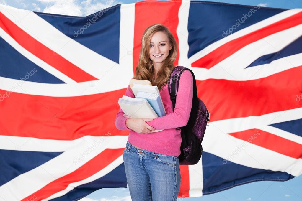 Female Student Holding Books