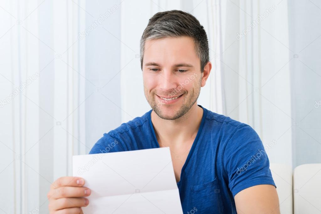 Man Holding Letter