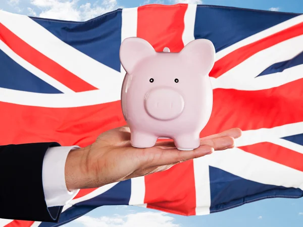 Businessman Holding Piggybank — Stock Photo, Image