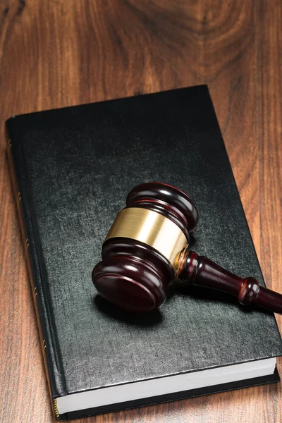 Gavel Over Book On Table — Stock Photo, Image