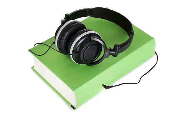 Cuffie sopra audiolibro verde — Foto Stock