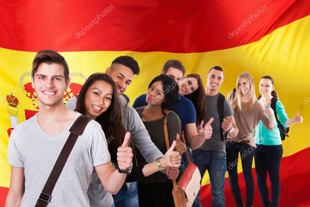 Students In Front Of Spanish Flag — Stock Photo © AndreyPopov #66382955