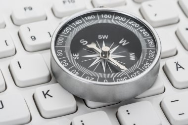 Compass On Computer Keyboard clipart