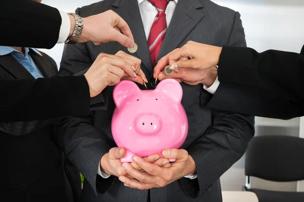 Hands Inserting Coins — Stock Photo, Image