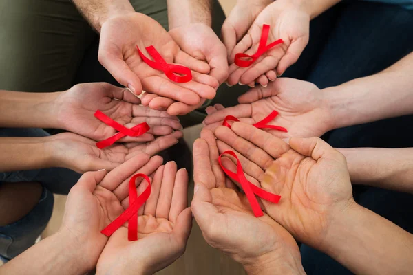 People Holding Aids Ribbons — Stock Photo, Image