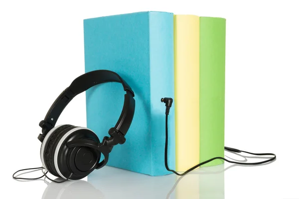 Libros de audio con auriculares —  Fotos de Stock