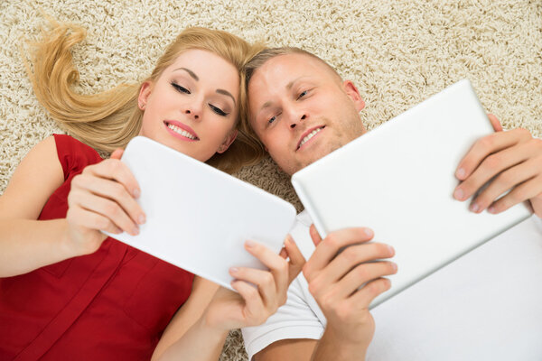 Couple With Digital Tablets