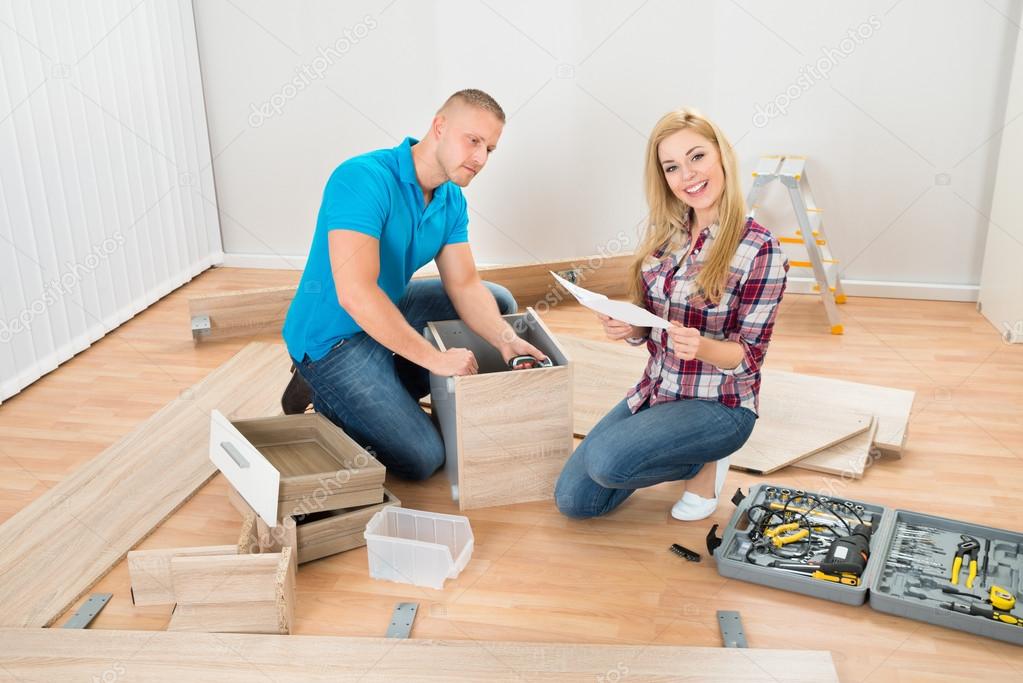 Couple Assembling Furniture