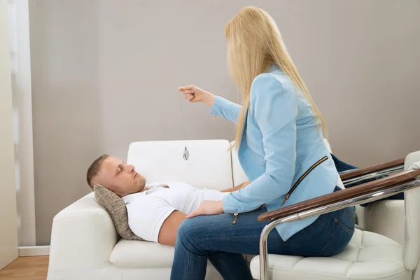 Psychiatrist Hypnotizing Patient — Stock Photo, Image