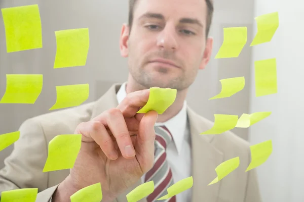 Businessman Looking At Adhesive Notes — Stock Photo, Image