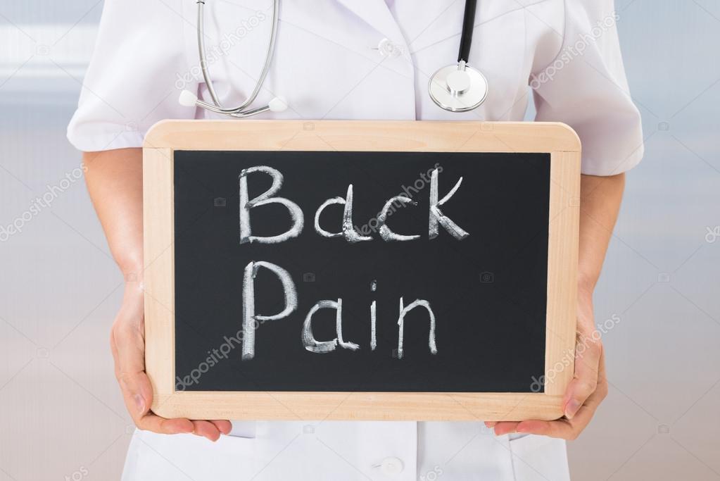 Doctor With Back Pain Text Stock Photo by ©AndreyPopov 70820957