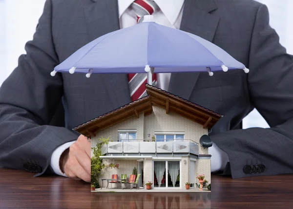 Businessman With  House Model — Stock Photo, Image
