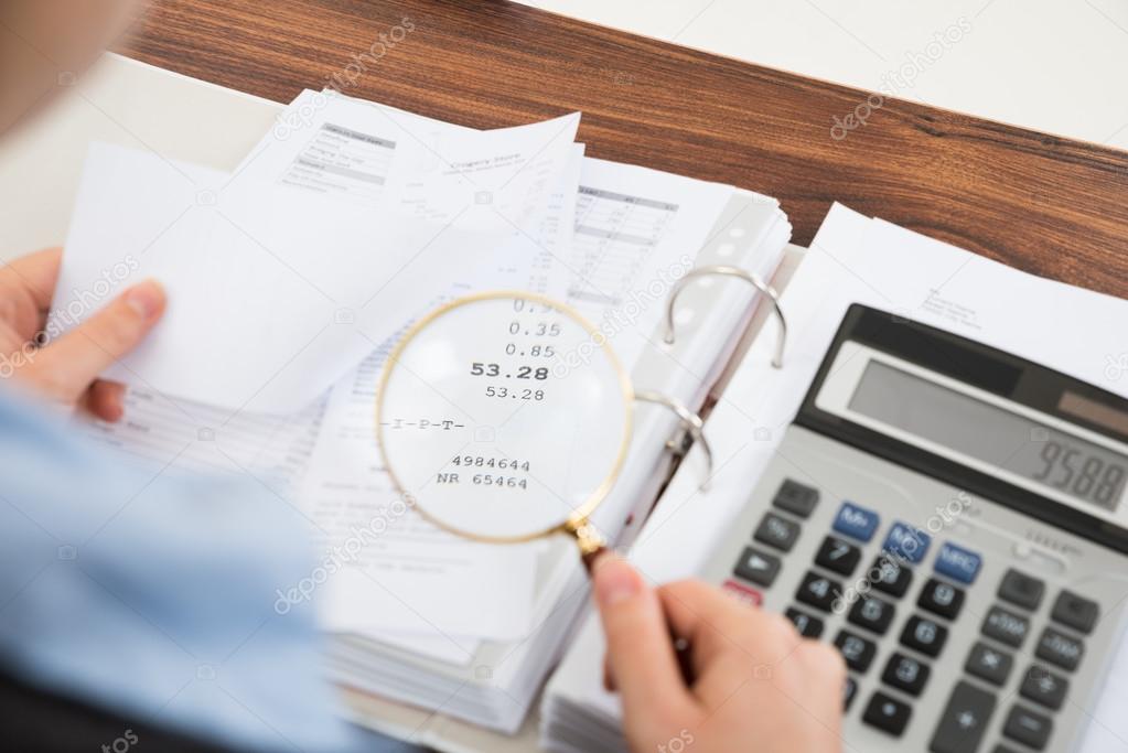 Businessperson Examining Receipts