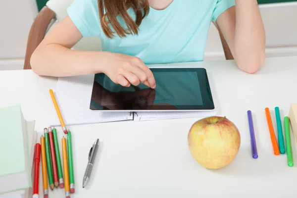 Schoolgirl Touching Digital Tablet — Stock Photo, Image