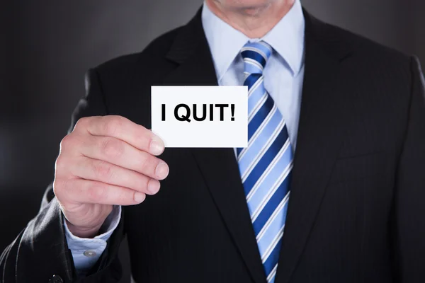 Businessman Showing Card With I Quit Sign — Stock Photo, Image