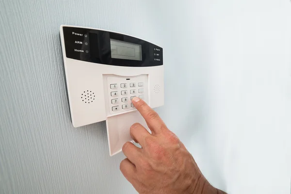 Person's Hand Entering Code — Stock Photo, Image