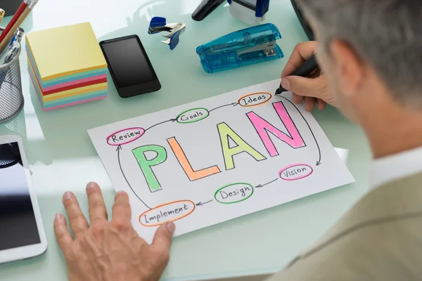 Zakenman tekening plan — Stockfoto