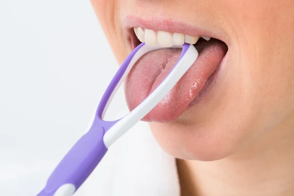 Woman Using Tongue Cleaner — Stock Photo, Image