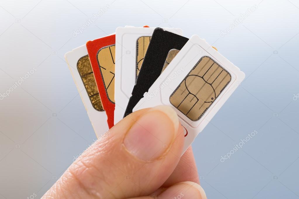 Hand With Phone Sim Cards