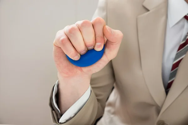 Empresário Espremendo Stressball — Fotografia de Stock