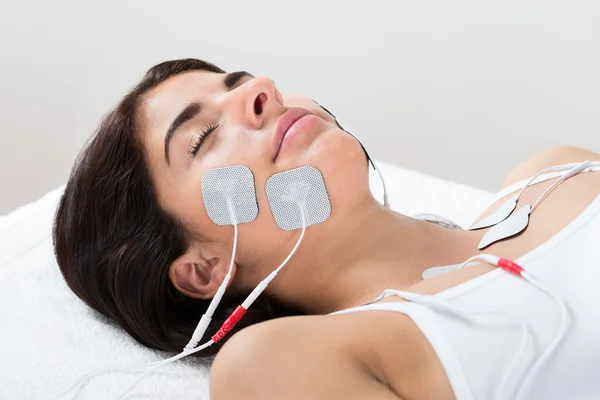 Woman With Electrodes On Face — Stock Photo, Image