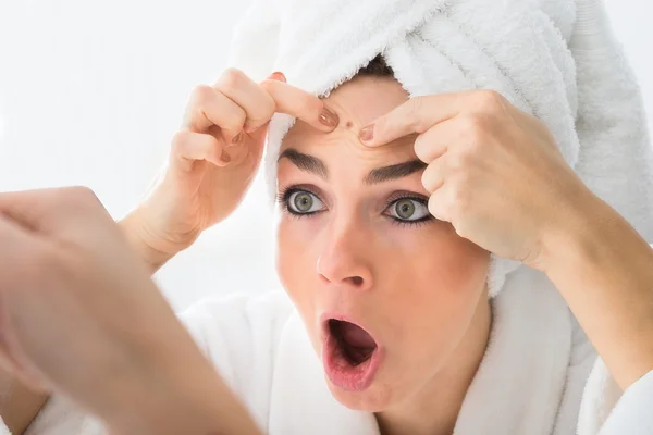 Woman Looking At Pimple — Stock Photo, Image