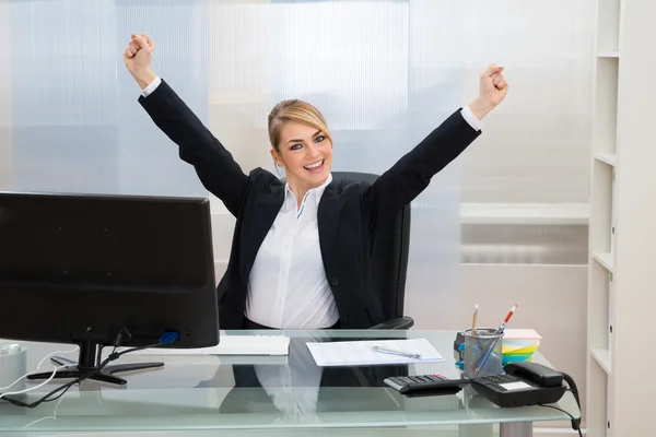 Businesswoman Raising Hands Stock Image