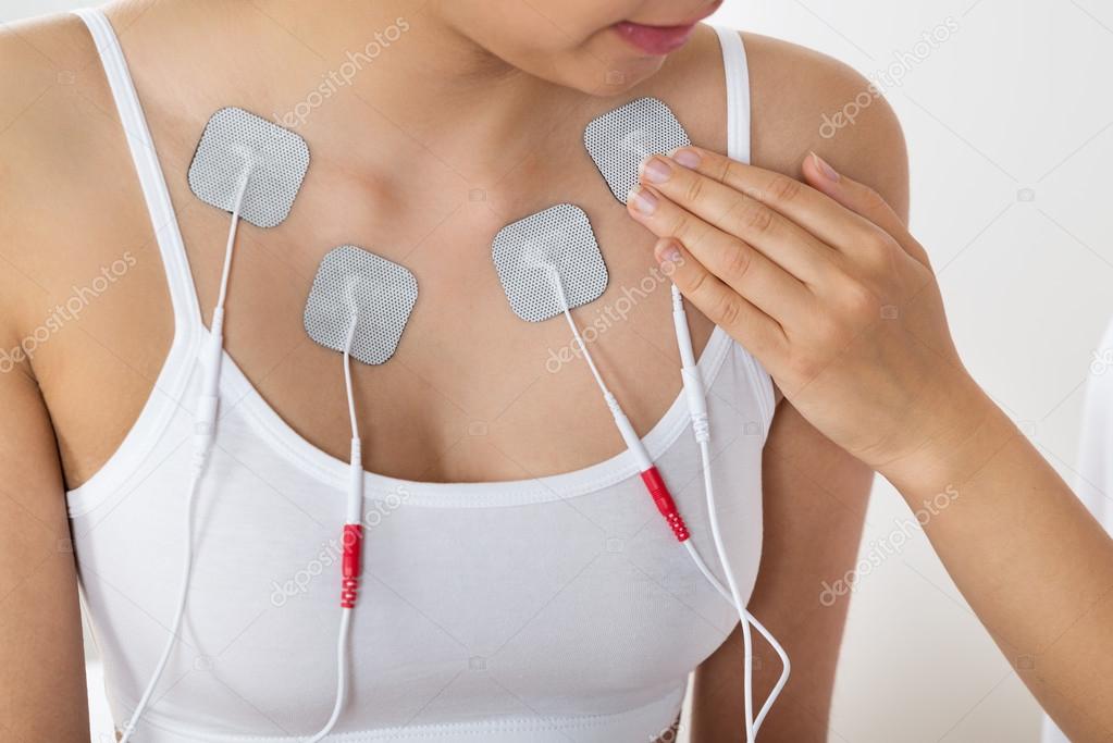 Woman Getting Electrodes Therapy