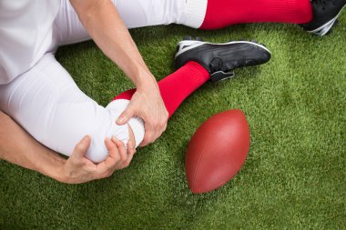 Yaralanma ile Amerikan futbolu oyuncusu