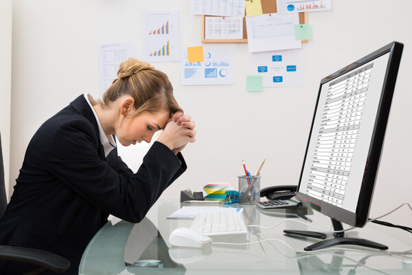 Stressed Businesswoman In Office