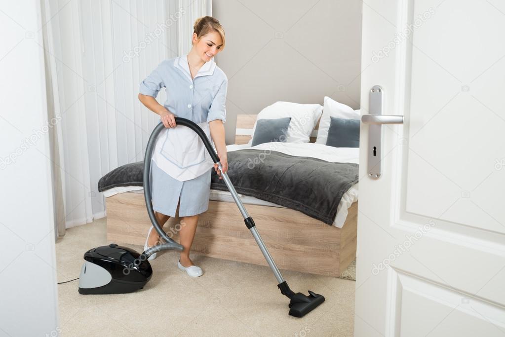 Maid With Vacuum Cleaner