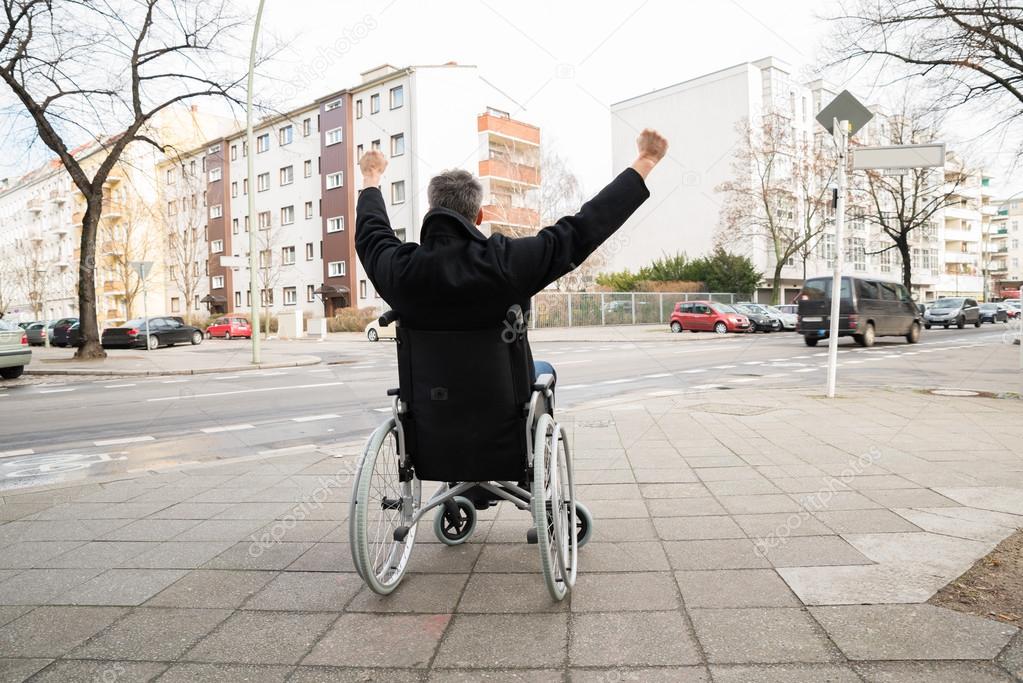 Disabled Man On Wheelchair