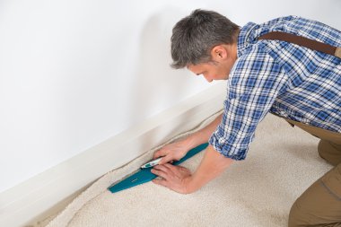 Craftsman Fitting Carpet clipart