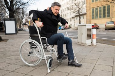 Disabled Man Trying To Walk