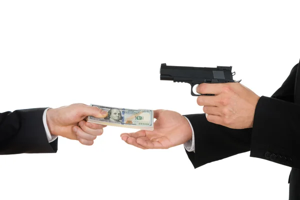 Geschäftsmann gibt Geld — Stockfoto