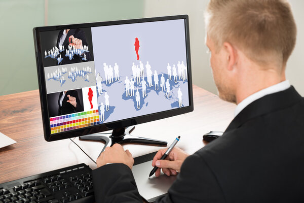 Businessman Using Graphic Tablet