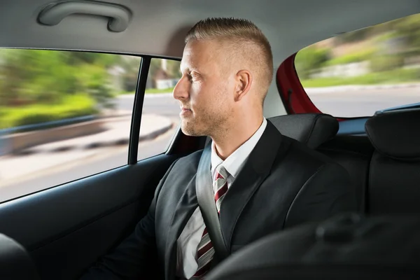 Businessman Traveling In Car — Stock Photo, Image